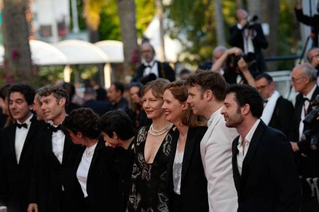 The Elemental Red Carpet Premiere at the 76th Edition of the Cannes Film Festival Director Justine Triet, winner of The Palme D Or Award for Anatomy of a Fall ( Anatomie d une chute ), alongside Milo Machado Graner, Arthur Harari, Antoine Reinartz, and Sandra Huller attend the movie screening and red carpet event for Elemental , directed by Peter Sohn, during the 76th edition of the Cannes Film Festival on May 27 2023, in Cannes, France Cannes Palace of Festivals and Congresses of Cannes Cannes France Copyright: xAlexandraxFechetex _ADR9658