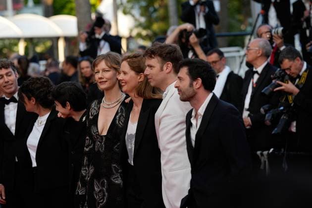 The Elemental Red Carpet Premiere at the 76th Edition of the Cannes Film Festival Director Justine Triet, winner of The Palme D Or Award for Anatomy of a Fall ( Anatomie d une chute ), alongside Milo Machado Graner, Arthur Harari, Antoine Reinartz, and Sandra Huller attend the movie screening and red carpet event for Elemental , directed by Peter Sohn, during the 76th edition of the Cannes Film Festival on May 27 2023, in Cannes, France Cannes Palace of Festivals and Congresses of Cannes Cannes France Copyright: xAlexandraxFechetex _ADR9662