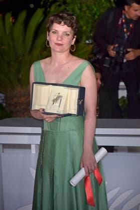 Flora Anna Buda holds The Short Film Palme d or Award during the Palme D Or winners photocall at the 76th annual Cannes film festival at Palais des Festivals on Saturday, May 27, 2023 in Cannes, France.  CAN20230527202 RoccoxSpaziani