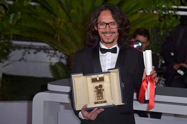 Director Pham Thien An holds The CamÃ ra d or Award for Inside The Yellow Cocoon Shell and President of the Camera d Or Jury AnaÃ¯s Demoustier (R) during the Palme D Or winners photocall at the 76th annual Cannes film festival at Palais des Festivals on Saturday, May 27, 2023 in Cannes, France.  CAN20230527219 RoccoxSpaziani