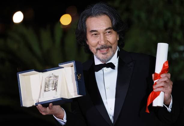 (230528) -- CANNES, May 28, 2023 -- Japanese actor Koji Yakusho poses during a photocall with his trophy after he won the Best Actor award for his part in the film Perfect Days during the closing ceremony of the 76th edition of the Cannes Film Festival in Cannes, southern France, May 27, 2023. ) FRANCE-CANNES-FILM FESTIVAL-AWARDS GaoxJing 