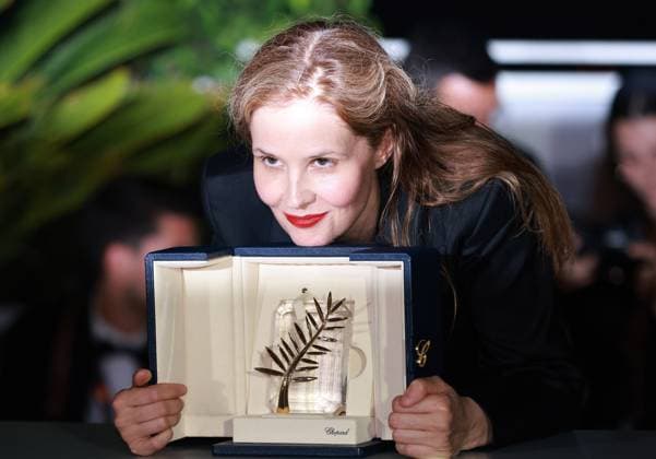 (230528) -- CANNES, May 28, 2023 -- French director Justine Triet poses with the trophy during a photocall after she won the Palme d Or for the film Anatomie d une Chute (Anatomy of a Fall) during the closing ceremony of the 76th edition of the Cannes Film Festival in Cannes, southern France on May 27, 2023. French director Justine Triet was awarded with the Palme d Or at the 76th Cannes Film Festival for her Anatomy of a Fall on Saturday in Cannes, France, becoming the third female director winning this top prize. ) FRANCE-CANNES-FILM FESTIVAL-PALME D OR GaoxJing 