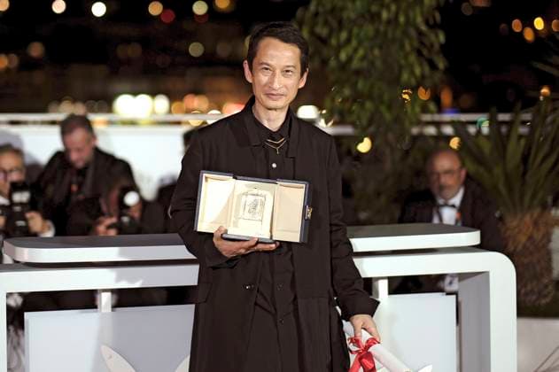 Tran Anh Hung with the best director award for La passion de Dodin Bouffant at the photocall with the award winners at the Festival de Cannes 2023 76 Cannes International Film Festival at the Palais des Festivals Cannes, 27 05 2023. Foto:xD.xBedrosianx xFuturexImage
