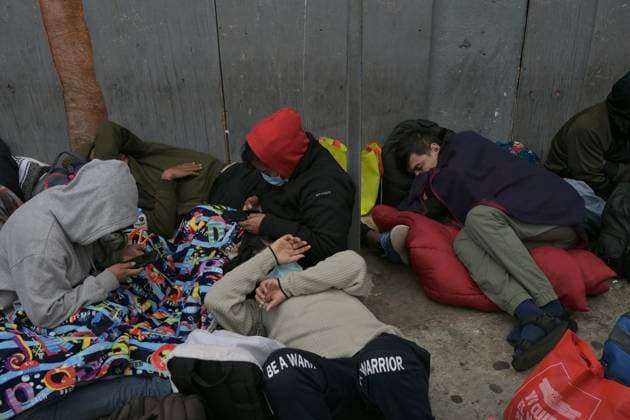 May 29, 2023, Tijuana, Baja California, Mexico: Around thirty migrants from the countries of Russia, Mexico, Venezuela, Colombia and some Central American nations began camping outside the Tijuana-San Ysidro Port of Entry on Monday, May 29, 2023 due to a growing frustration in the CBPOne asylum appÃ¢â‚¬â ¢s technician bugs and oversaturated appointment schedule in use by many people throughout the US-Mexico Southern Border after Title 42 was lifted and Title 8 was implemented thereafter as its replacement as border policy. ..Currently the CBPOne app is the only means of processing legal asylum claims for thousands of migrants who are seeking to enter the United States. Tijuana Mexico - ZUMAm180 20230529_zip_m180_010 Copyright: xCarlosxA.xMorenox