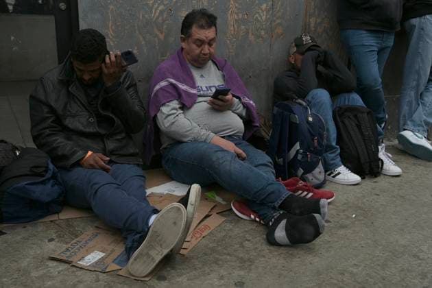 May 29, 2023, Tijuana, Baja California, Mexico: Around thirty migrants from the countries of Russia, Mexico, Venezuela, Colombia and some Central American nations began camping outside the Tijuana-San Ysidro Port of Entry on Monday, May 29, 2023 due to a growing frustration in the CBPOne asylum appÃ¢â‚¬â ¢s technician bugs and oversaturated appointment schedule in use by many people throughout the US-Mexico Southern Border after Title 42 was lifted and Title 8 was implemented thereafter as its replacement as border policy. ..Currently the CBPOne app is the only means of processing legal asylum claims for thousands of migrants who are seeking to enter the United States. Tijuana Mexico - ZUMAm180 20230529_zip_m180_015 Copyright: xCarlosxA.xMorenox