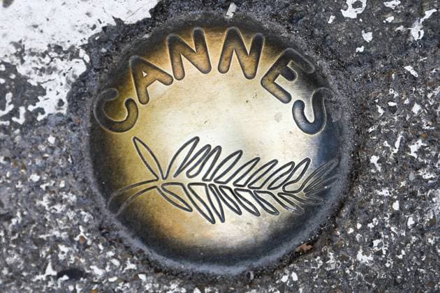 Daily Life In Cannes The Golden Palm of the Cannes Festival symbol is seen on the street near the Palais des Festivals in Cannes, France on May 24, 2023. Cannes France  Copyright: xJakubxPorzyckix originalFilename: porzycki-dailylif230524_npP5P.jpg