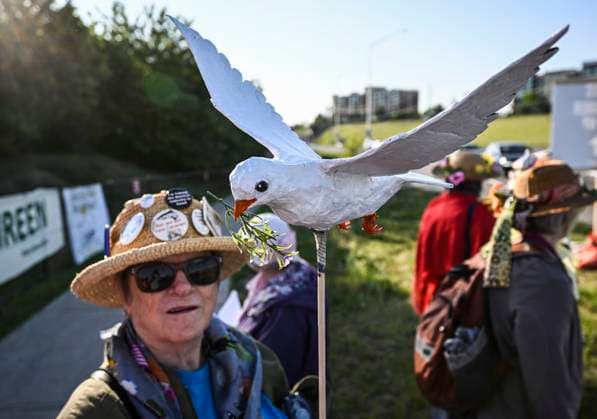 May 31, 2023, Ottawa, ON, CAN: An anti-war protester holds a paper mache dove on a stick, as they rally at an entrance to the CANSEC trade show, billed as North AmericaöÄÃ s largest multi-service defence event, in Ottawa, on Wednesday, May 31, 2023. Ottawa CAN - ZUMAc35_ 20230531_zaf_c35_008 Copyright: xJustinxTangx