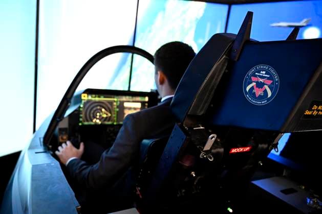 May 31, 2023, Ottawa, ON, CAN: An attendee tries a simulator of the Lockheed Martin F-35 Lightning at the CANSEC trade show, billed as North AmericaöÄÃ s largest multi-service defence event, in Ottawa, on Wednesday, May 31, 2023. Ottawa CAN  - ZUMAc35_ 20230531_zaf_c35_036 Copyright: xJustinxTangx