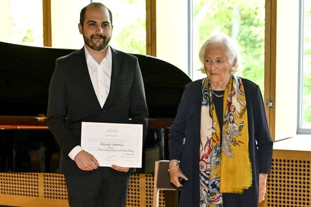 Alexandre Chenorkian and Queen Paola of Belgium pictured during the Academic Closing Ceremony at the Queen Elisabeth Music chapel, in Waterloo, Friday 02 June 2023. The Queen will present the Artists in Residence at the Queen Elisabeth Music Chapel with their Artist Diploma, marking the end of their residency at the Queen Elisabeth Music Chapel.  DIRKxWAEM 68311447