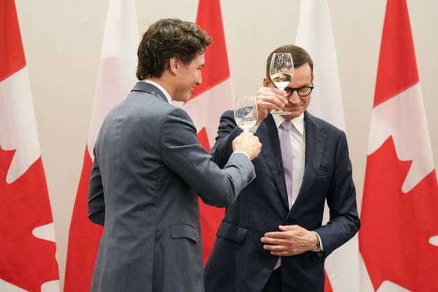 June 2, 2023, TORONTO, ON, Canada: Prime Minister Justin Trudeau (left) and Poland Prime Minister Mateusz Morawiecki make a toast at a luncheon in Toronto on Friday, June 2, 2023. TORONTO Canada  - ZUMAc35_ 20230602_zaf_c35_054 Copyright: xChrisxYoungx