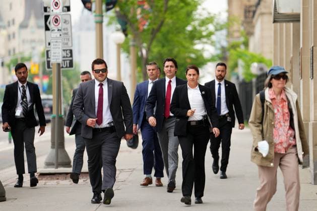 June 5, 2023, Ottawa, ON, CANADA: Prime Minister Justin Trudeau is flanked by security as he walks on the sidewalk on his way to a press conference, in Ottawa, Monday, June 5, 2023. Ottawa CANADA  - ZUMAc35_ 20230605_zaf_c35_013 Copyright: xSeanxKilpatrickx