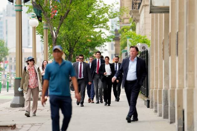 June 5, 2023, Ottawa, ON, CANADA: Prime Minister Justin Trudeau is flanked by security as he walks on the sidewalk on his way to a press conference, in Ottawa, Monday, June 5, 2023. Ottawa CANADA  - ZUMAc35_ 20230605_zaf_c35_014 Copyright: xSeanxKilpatrickx