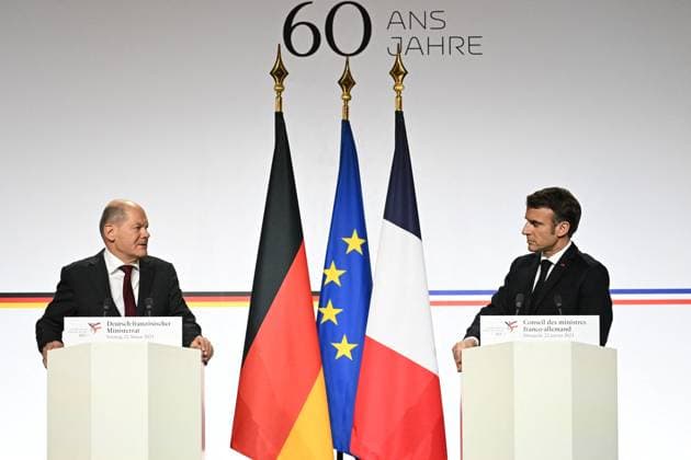 Franco-German Press Conference - Paris French President Emmanuel Macron and German Chancellor Olaf Scholz hold a press conference following a Franco-German joint cabinet meeting as part of the celebration of the 60th anniversary of the signing of the Elysee Treaty, to seal reconciliation between France and West Germany, 18 years after the Second World War at the presidential Elysee Palace in Paris, France on January 22, 2023. Photo by Eric Tschaen Pool ABACAPRESS.COM Paris IDF France  Copyright: xTschaenxEric Pool ABACAx 839342_011 TschaenxEric Pool ABACAx 839342_011