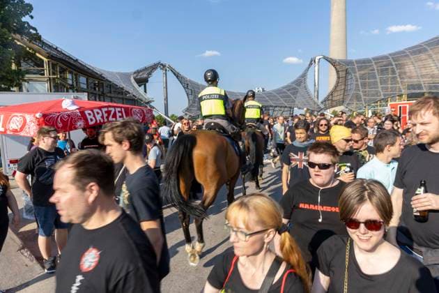 Mounted police on horses between fans at Rammstein concert of Till Lindemann in Olympiapark in Munich date 07 06 2023