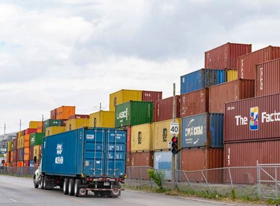 June 9, 2023, MONTREAL, PQ, CANADA: A truck drives past a transloading and container storage facility in Montreal, Friday, June 9, 2023. MONTREAL CANADA  - ZUMAc35_ 20230609_zaf_c35_083 Copyright: xChristinnexMuschix
