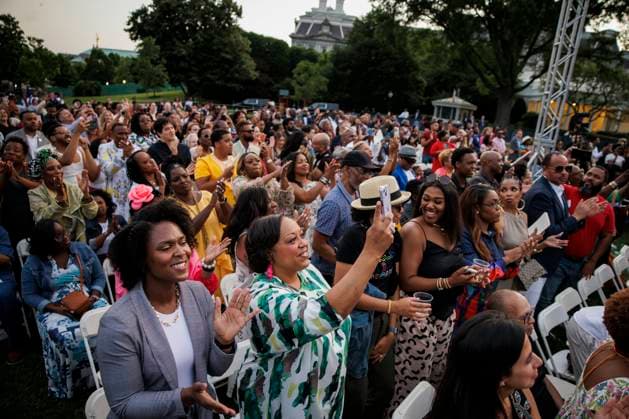 DC: President Biden Hosts a Juneteenth Concert on the South Lawn Attendees react to a performance from Broadway Inspirational Voices during a Juneteenth concert on the South Lawn of the White House on June 13, 2023 in Washington, D.C. Juneteenth celebrates the emancipation of enslaved African Americans on June 19th and was declared a federal holiday in 2021 by President Joe Biden. (Photo by Samuel Corum Pool ABACAPRESS.COM) Washington The White House DC United States  Copyright: xPool ABACAx 856900_036 Pool ABACAx 856900_036