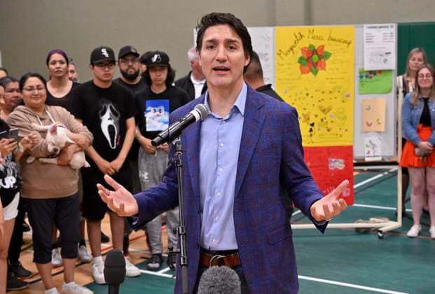 June 14, 2023, SAGUENAY, PQ, Canada: Prime Minister Justin Trudeau speaks to Indigenous people of Ouje-Bougoumou who were evacuated because of wildfires, Wednesday, June 14, 2023 at Chicoutimi Cegep in Saguenay, Que. SAGUENAY Canada  - ZUMAc35_ 20230614_zaf_c35_025 Copyright: xJacquesxBoissinotx