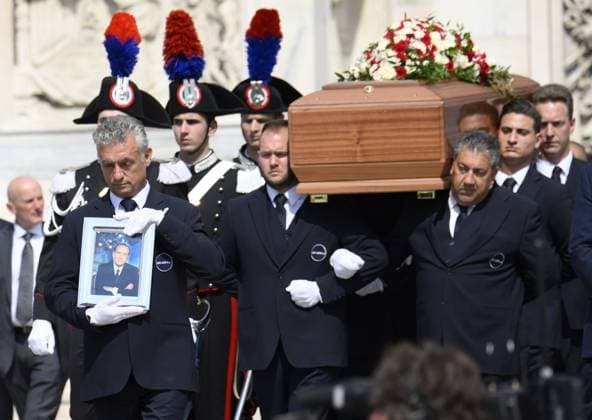 (230614) -- MILAN (ITALY), June 14, 2023 -- The casket of Silvio Berlusconi leaves the Duomo di Milano in Milan, Italy, on June 14, 2023. Thousands of mourners packed the area around the Duomo di Milano in Milan on Wednesday to bid farewell to Silvio Berlusconi, the Italian media mogul and former prime minister who died Monday at the age of 86. (Photo by Xinhua) ITALY-MILAN-BERLUSCONI-STATE FUNERAL AlbertoxLingria 