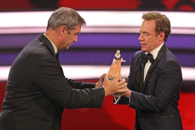 Markus Söder and Michael Bully Herbig award ceremony Bavarian Film Award 2022 Bavarian Prime Minister Dr Markus Söder li presents Michael Bully Herbig with the honorary award award ceremony of the 44 Bavarian Film Award 2022 on 16 06 2023 in Munich Prinzregententheater Munich, Bavaria, Germany