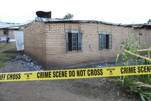 Bilder des Jahres 2023, News June 06 News Themen der Woche KW24 News Bilder des Tages (230619) -- KASESE, June 19, 2023 -- This photo taken on June 18, 2023 shows a tap cordoning off the burnt students dormitory inside the Lhubiriha Secondary School, in Mpondwe, Uganda. Calm has returned to Mpondwe town in Uganda s southwestern district of Kasese, where the Allied Democratic Forces (ADF) rebels killed 41 people, most of them students, a government official said Sunday. (Photo by Xinhua) UGANDA-KASESE-ADF-ATTACK-AFTERMATH HajarahxNalwadda 