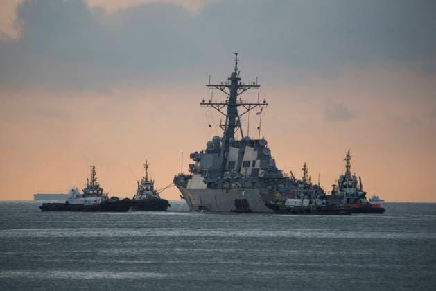 US Warships Transit Taiwan Strait Handout file photo dated Ocotber 5, 2017 of The Arleigh Burke-class guided-missile destroyer USS John S. McCain (DDG 56) is towed away from the pier at Changi Naval Base, Singapore. Two U.S. warships sailed through the sensitive Taiwan Strait on Thursday drawing protest from Beijing, the second such mission this month and coming almost two weeks after a Chinese aircraft carrier group used the same waterway. The U.S. Navy said the guided missile destroyers USS John S. McCain and USS Curtis Wilbur had conducted a routine Taiwan Strait transit Dec. 31 in accordance with international law . U.S. Navy photo by Mass Communication Specialist 2nd Class Joshua Fulton via ABACAPRESS.COM CHANGI Singapore  Copyright: xABACAx 751709_004 ABACAx 751709_004