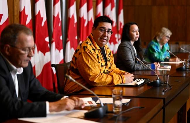 June 20, 2023, Ottawa, ON, CAN: Chief Dylan Whiteduck of Kitigan Zibi Anishinabeg First Nation, second from left, speaks during a news conference on the opposition to a planned radioactive waste dump near the Ottawa River at the Chalk River Laboratories, in Ottawa, on Tuesday, June 20, 2023. From left, Chief Lance Haymond of Kebaowek First Nation, Chief Whiteduck, Grand Chief Savanna McGregor of the Algonquin Anishinabeg Nation Tribal Council, and Green Party leader Elizabeth May. Ottawa CAN - ZUMAc35_ 20230620_zaf_c35_013 Copyright: xJustinxTangx