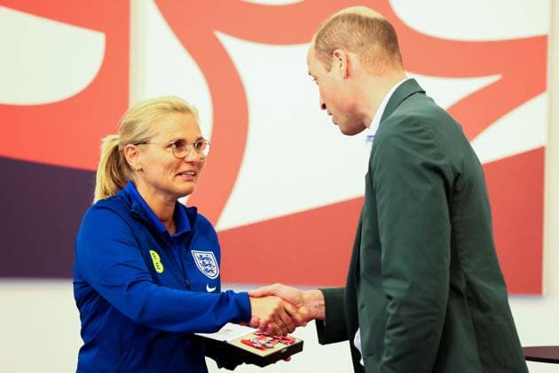 Britain s Prince William visits England Women s football team in Burton upon Trent Britain s Prince William, the Prince of Wales and President of The Football Association, gives an honorary CBE to England manager Sarina Wiegman as he visits England Women s team to wish them luck ahead of the 2023 FIFA Women s World Cup, at the national football centre at St. George s Park in Burton upon Trent, Britain June 20, 2023., Credit:PHIL NOBLE Avalon UNITED KINGDOM, BURTON UPON TRENT  Copyright: xPHILxNOBLEx xAvalonx 0784436369