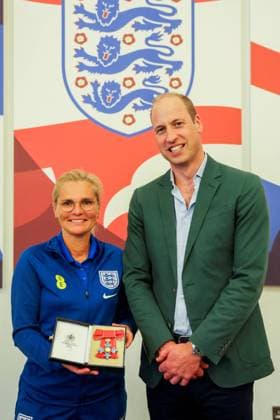 Britain s Prince William visits England Women s football team in Burton upon Trent Britain s Prince William, the Prince of Wales and President of The Football Association, gives an honorary CBE to England manager Sarina Wiegman as he visits England Women s team to wish them luck ahead of the 2023 FIFA Women s World Cup, at the national football centre at St. George s Park in Burton upon Trent, Britain June 20, 2023., Credit:PHIL NOBLE Avalon UNITED KINGDOM, BURTON UPON TRENT  Copyright: xPHILxNOBLEx xAvalonx 0784436375