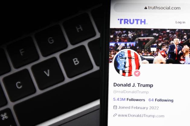 Donald Trump Truth Social Account Photo Illustrations A laptop keyboard and Donald Trump account on Truth Social displayed on a phone screen are seen in this illustration photo taken in United States on on June 20, 2023. Westford United States  Copyright: xJakubxPorzyckix originalFilename: porzycki-donaldtr230620_npdyW.jpg