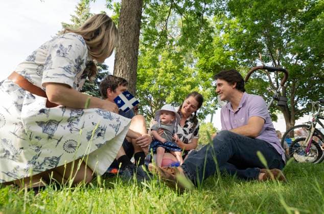 June 23, 2023, MONTREAL, PQ, CANADA: Prime Minister Justin Trudeau, and Minister of Foreign Affairs Melanie Jolie, left, greet families at a Fete nationale du Quebec event on Friday, June 23, 2023 in Montreal. MONTREAL CANADA  - ZUMAc35_ 20230623_zaf_c35_058 Copyright: xChristinnexMuschix