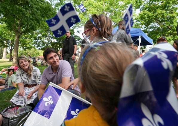 June 23, 2023, MONTREAL, PQ, CANADA: Prime Minister Justin Trudeau, and Minister of Foreign Affairs Melanie Jolie greet children during a Fete nationale du Quebec event on Friday, June 23, 2023 in Montreal. MONTREAL CANADA  - ZUMAc35_ 20230623_zaf_c35_060 Copyright: xChristinnexMuschix