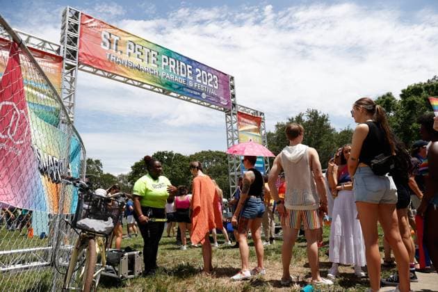 News Themen der Woche KW25 June 24, 2023, St. Petersburg, Florida, USA: Security workers check peopleÃ¢â‚¬â ¢s bags and get screened during the St. Pete Pride Parade at North Straub Park on Saturday, June 24, 2023, in St. Petersburg. St. Petersburg USA - ZUMAs70_ 20230624_zan_s70_032 Copyright: xJeffereexWoox