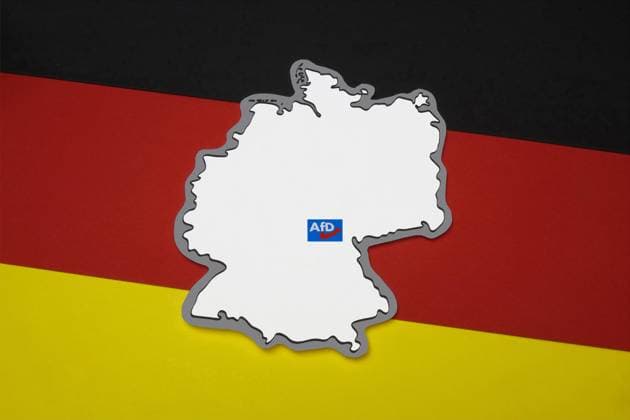 Deutschlandumriss und AfD in Sonneberg Deutschlandumriss und AfD in Sonneberg, 25.06.2023, Borkwalde, Brandenburg, Auf einer Deutschlandfahne liegt ein Deutschlandumriss mit einem AfD-Logo im Landkreis Sonneberg. *** Germany outline and AfD in Sonneberg Germany outline and AfD in Sonneberg, 25 06 2023, Borkwalde, Brandenburg, On a Germany flag lies a Germany outline with an AfD logo in Sonneberg county
