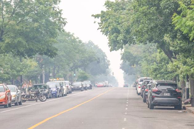 June 25, 2023, Montreal, Quebec, Canada: Wildfire smoke: As far as big cities go, Montreal has the worst air quality in the world on Sunday, according to a website that tracks air quality indexes (AQIs) across the globe...The smog is a product of wildfires in northern Quebec, 80 of which are currently burning. Winds shifted to the northeast Monday evening, blanketing parts of southern Quebec in smoke. Montreal Canada - ZUMAs278 20230625_zip_s278_008 Copyright: xSerkanxSenturkx