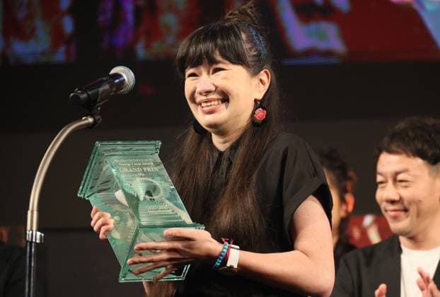 June 26, 2023, Tokyo, Japan - Poland based Japanese animation artist Izumi Yoshida receives the trophy of the George Lucas award at the awarding ceremony of the Short Shorts Film Festival & Asia 2023 in Tokyo on Monday, June 26, 2023. Yoshida won the George Lucas award, grand prix of the film festival for her short animation movie The Bridge . (photo by Yoshio Tsunoda AFLO)  , aflo_222753580.jpg,
