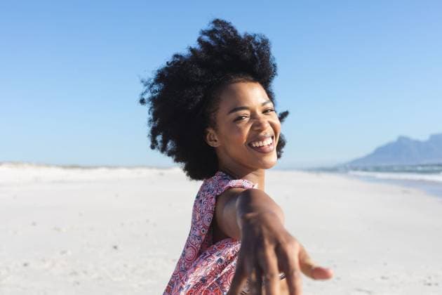 Portrait of happy african american woman smiling with hand outstretched on sunny beach Portrait of happy african american woman smiling with hand outstretched on sunny beach. Summer, wellbeing, freedom, relaxation and vacation, unaltered., model released, , property released, Cape Town, South Africa, 19.01.2023, 4052945.jpg, people,portrait,happy,african american,woman smiling,hand,outstretched,sunny beach,summer,wellbeing,freedom,relaxation,vacation,unaltered,young,lifestyle,person,beautiful,adult,nature,holiday,fun,leisure,outdoor,smile,travel,beauty,beach,happiness,attractive,cute,sea,face,african,american,woman,smiling,sunny Mid Adult,Woman,Female,Black