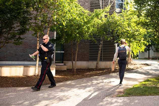June 28, 2023, Waterloo, ON, Canada: A member of the Waterloo Regional Police walks on campus following a stabbing at the University of Waterloo, in Waterloo, Ont., Wednesday, June 28, 2023. Waterloo Regional Police said three victims were stabbed inside the universitys Hagey Hall, with one person was taken into custody. Waterloo Canada - ZUMAc35_ 20230628_zaf_c35_113 Copyright: xNickxIwanyshynx