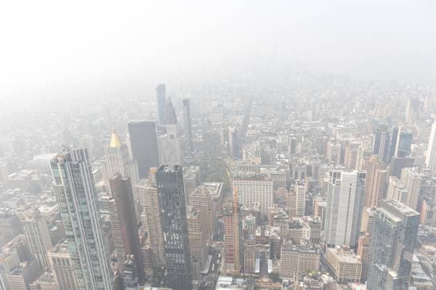 June 30, 2023, New York City, NY, USA: View from the The Empire State Building the haze from Canadian wildfire smoke in New York City June 30, 2023. Smoke from Canada s worst-ever wildfires continues to impact air quality across Ontario and the eastern US, with monitors warning that over one hundred million people face potentially unhealthy conditions New York City USA - ZUMAc233 20230630_zsp_c233_069 Copyright: xVanessaxCarvalhox