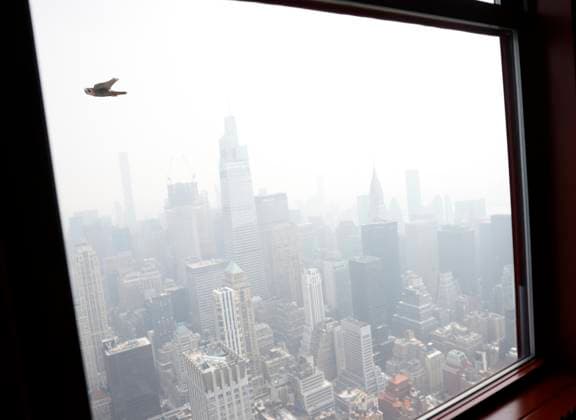 Haze and smoke due to on going wildfires in Canada shroud the views from the top of the Empire State Building of Chrysler Building and the Manhattan skyline on Friday, June 30, 2023 in New York City.  NYP20230630105 JohnxAngelillo