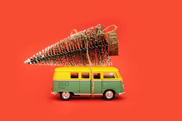 Miniature hippy car with fir tree on red background. minimal new yrar 2020 Miniature hippy car with fir tree on red background. minimal Copyright: xZoonar.com AlexandraxTroyanx 16132592