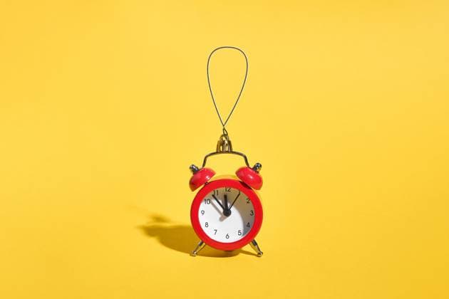 Red retro alarm clock on yellow background. Minimal time concept. Christmas or New year eve. Red retro alarm clock on yellow background. Minimal time concept. Christmas or New year eve. . High quality photo Copyright: xZoonar.com AlexandraxTroyanx 16143231