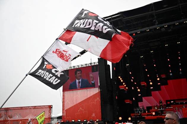 July 1, 2023, Ottawa, ON, CANADA: Protestors wave flags as they try to disrupt a speech by Prime Minister Justin Trudeau during Canada Day celebrations at LeBreton Flats, Ottawa on Saturday July 1, 2023. Ottawa CANADA  - ZUMAc35_ 20230701_zaf_c35_020 Copyright: xJustinxTangx
