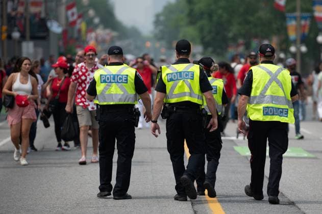 July 1, 2023, Ottawa, ON, Canada: Members of the Ottawa Police Service (OPS) patrol a section of Wellington St., as people take part in Canada Day celebrations in downtown Ottawa, on Saturday, July 1, 2023. Ottawa Canada  - ZUMAc35_ 20230701_zaf_c35_075 Copyright: xSpencerxColbyx