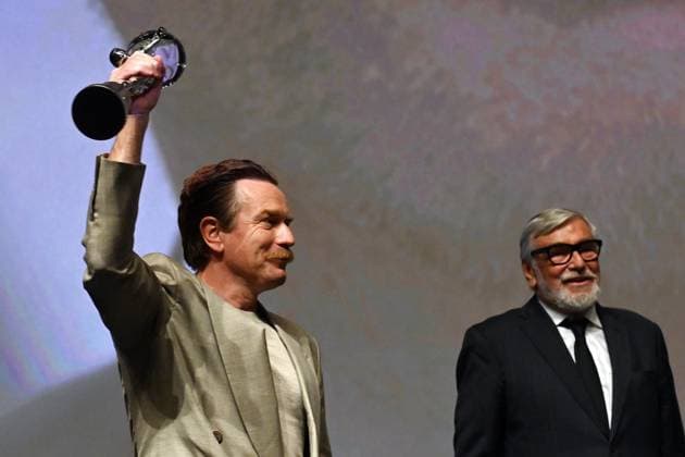 Scottish actor Ewan McGregor, left, received the Festival President’s Award from the President Jiri Bartoska, right, during the 57th Karlovy Vary International Film Festival (KVIFF), on July 1, 2023, at the Thermal Hotel in Karlovy Vary, Czech Republic. (CTKxPhoto SlavomirxKubes) CTKPhotoP2023070105795  CTKPhotoP2023070105795