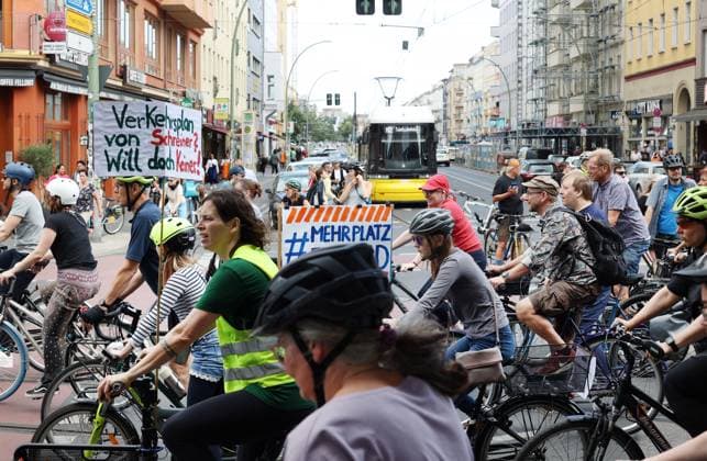 02 07 2023, Berlin Germany Under the hashtag nichtmituns there is a demo for cycling by Changing Cities, the start is at Eberswalder Straße Unfortunately, the streetcar is in traffic jam