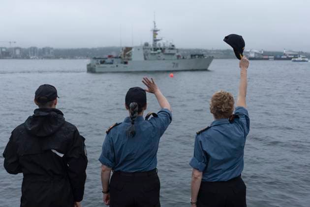 July 3, 2023, Halifax, NS, Canada: Rear-Admiral Joso e Kurtz, right, raises her cap during the first departure ceremony under her command in Halifax, Monday, July 3, 2023. HMCS Summerside and HMCS Shawinigan deployed to join Standing NATO Mine Countermeasures as part of Operation REASSURANCE to strengthen security throughout European waters. Halifax Canada  - ZUMAc35_ 20230703_zaf_c35_005 Copyright: xDarrenxCalabresex