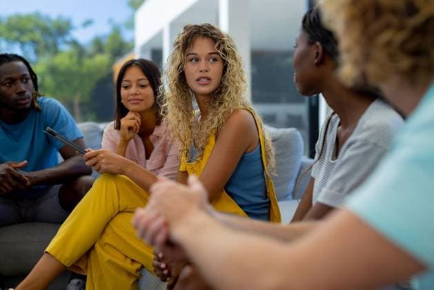 Group of diverse people sitting on sofa, using tablet and talking in group therapy session Group of diverse people sitting on sofa, using tablet and talking in group therapy session. Lifestyle, communication, friendship and support, togetherness, unaltered., model released, , property released, Cape Town, South Africa, 02.03.2023, 4052191.jpg, people,group,diverse,sitting,sofa,using tablet,talking,therapy,session,gen z,lifestyle,communication,friendship,support,togetherness,unaltered,young,person,together,adult,happy,friends,smiling,internet,leisure,indoors,cheerful,team,teamwork,casual,computer,happiness,women,portrait,meeting,fun,using,tablet Young Adult,Woman,Female,Black,Multiracial,Man,Male,Mid Adult,White