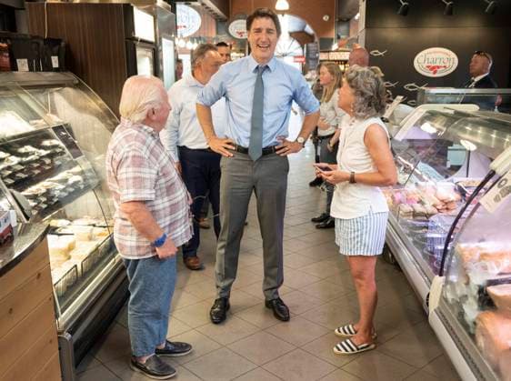 July 5, 2023, St.-Hyacinthe, PQ, Canada: Prime Minister Justin Trudeau chats with shoppers while visiting a market in St.-Hyacinthe, Que., Wednesday, July 5, 2023. St.-Hyacinthe Canada  - ZUMAc35_ 20230705_zaf_c35_055 Copyright: xRyanxRemiorzx