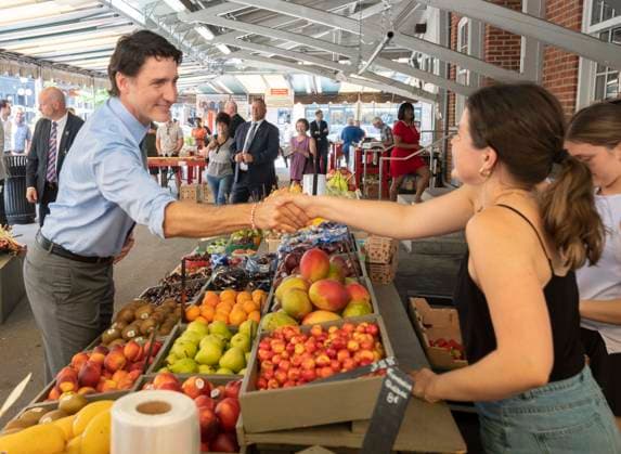 July 5, 2023, St.-Hyacinthe, PQ, Canada: Prime Minister Justin Trudeau gfreets vendors while visiting a market in St.-Hyacinthe, Que., Wednesday, July 5, 2023. St.-Hyacinthe Canada  - ZUMAc35_ 20230705_zaf_c35_056 Copyright: xRyanxRemiorzx