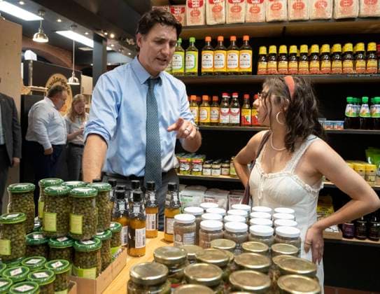 July 5, 2023, St.-Hyacinthe, PQ, Canada: Prime Minister Justin Trudeau chats with shoppers while visiting a market in St.-Hyacinthe, Que., Wednesday, July 5, 2023. St.-Hyacinthe Canada  - ZUMAc35_ 20230705_zaf_c35_057 Copyright: xRyanxRemiorzx